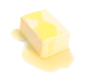 Photo of Piece of melting butter on white background