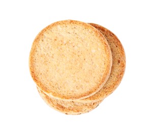 Photo of Stack of tasty organic rusks isolated on white, top view