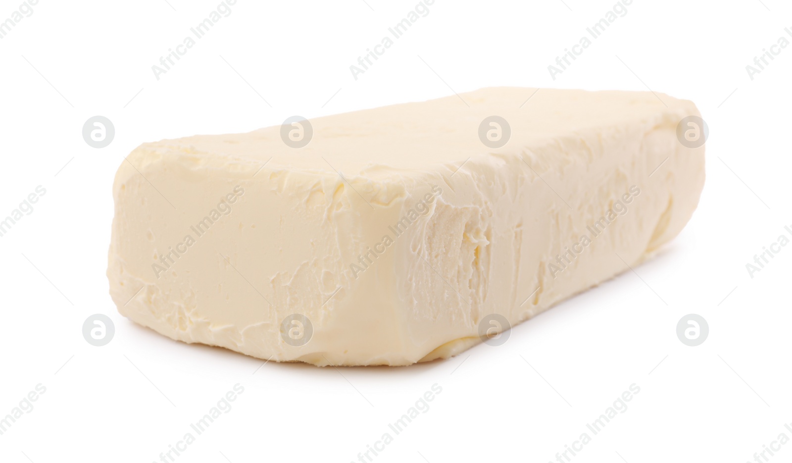 Photo of Block of tasty butter isolated on white