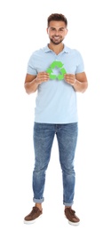 Photo of Young man with recycling symbol on white background