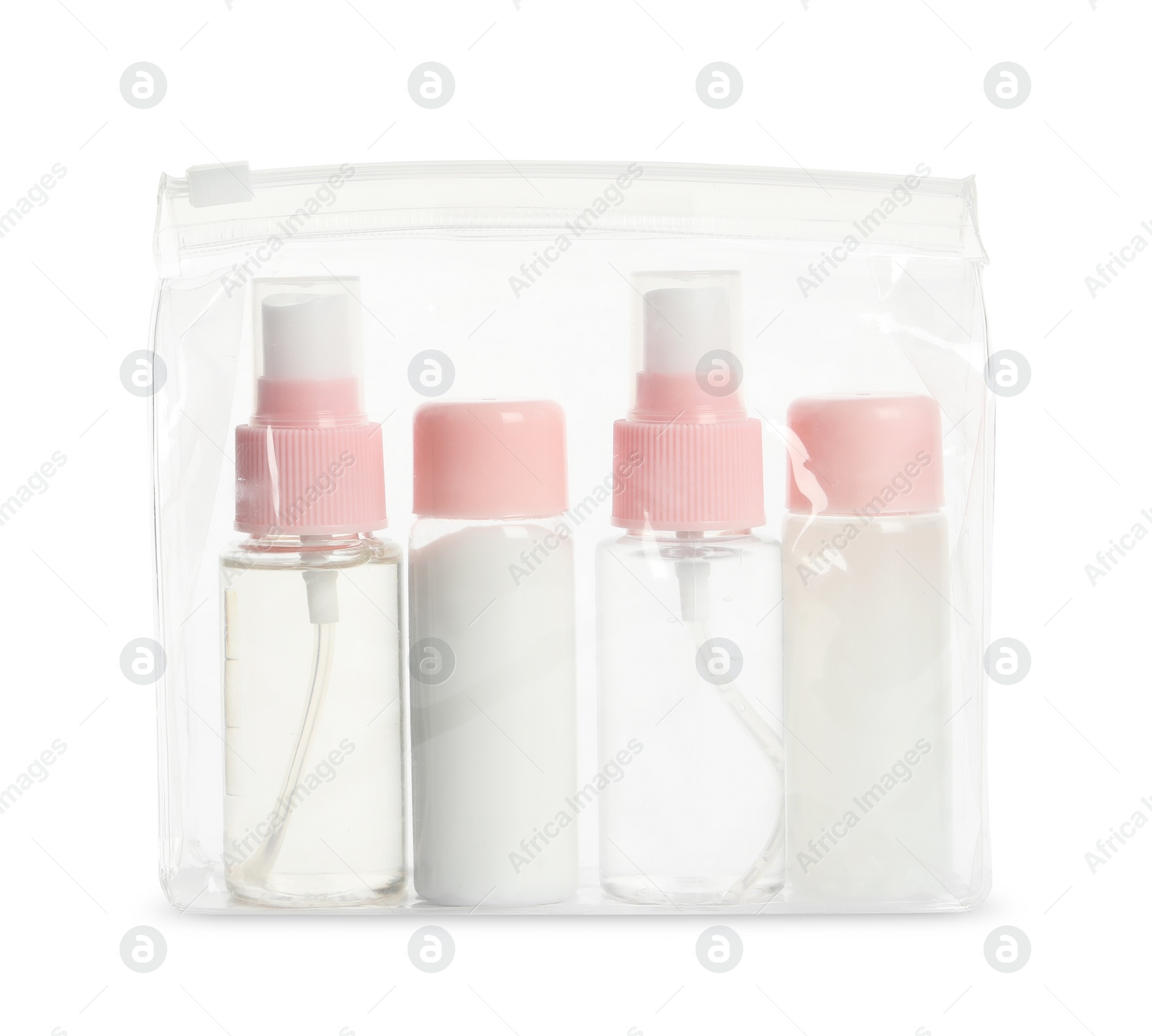 Photo of Cosmetic travel kit in plastic bag isolated on white