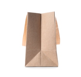 Photo of Paper shopping bag with comfortable handles on white background