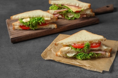 Photo of Tasty toast sandwich on table. Wheat bread