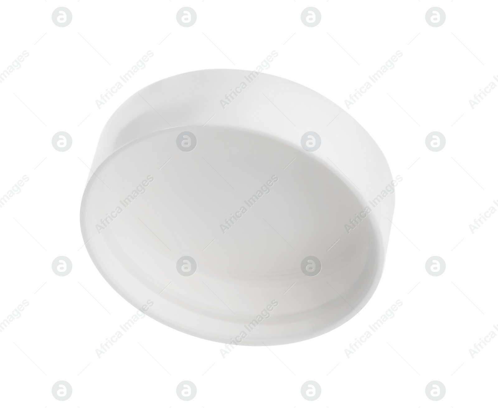 Photo of One plastic bottle cap isolated on white