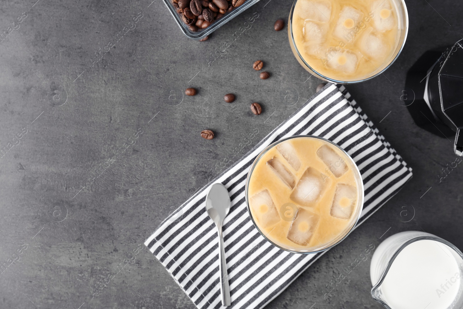 Photo of Flat lay composition with cold brew coffee and milk on grey background