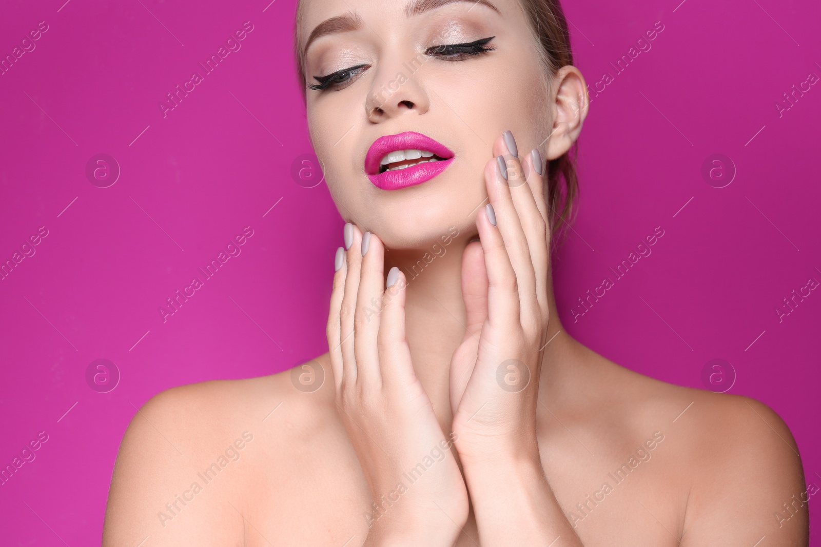 Photo of Beautiful young woman with perfect lips makeup on color background, closeup