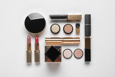 Set of luxury makeup products on white background, flat lay