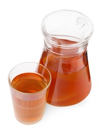 Tasty kombucha in glass and jug isolated on white