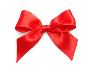 Photo of Red ribbon bow on white background, top view