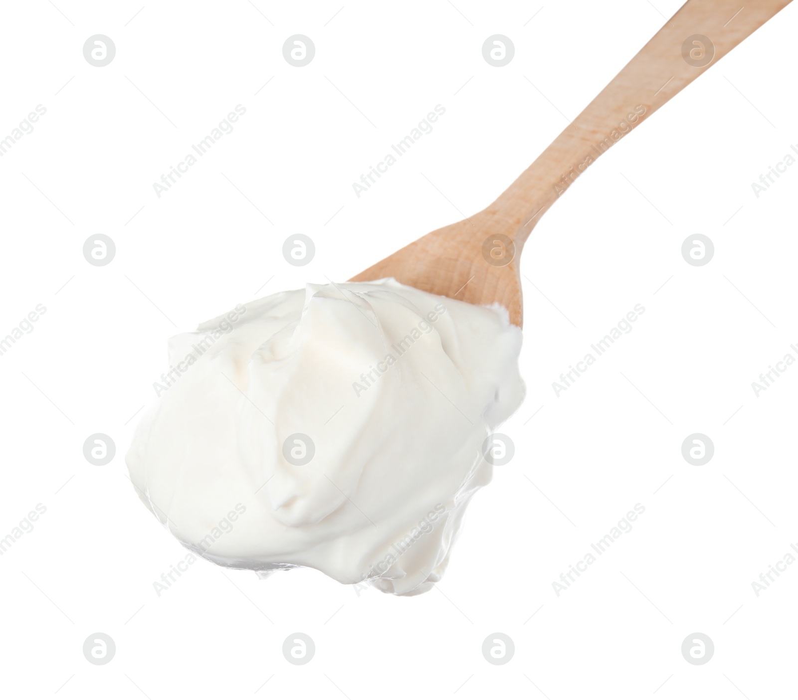 Photo of Wooden spoon with sour cream on white background