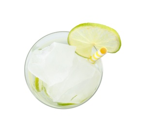 Glass of drink with lime and ice cubes isolated on white, top view