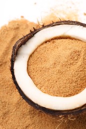 Coconut sugar and fruit on table, above view