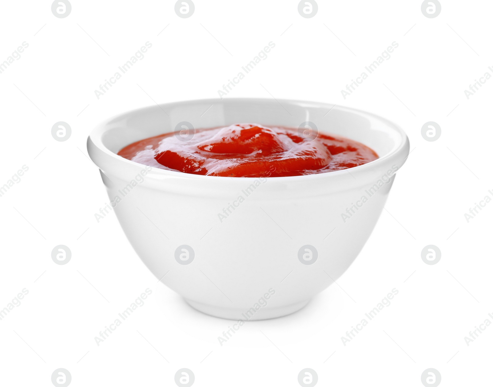 Photo of Tasty tomato sauce in bowl isolated on white