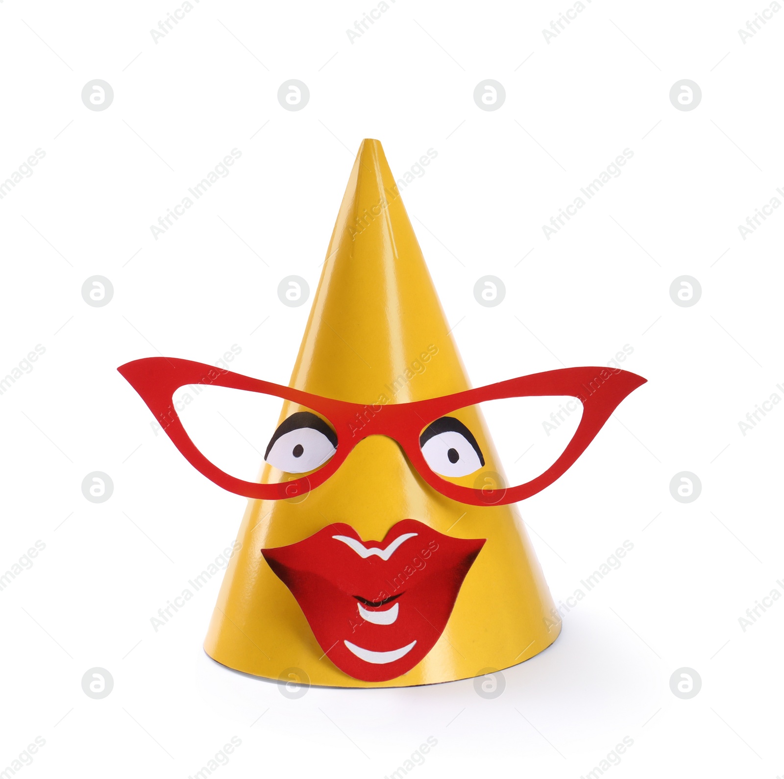 Photo of Bright party hat with funny face isolated on white. Handmade decoration