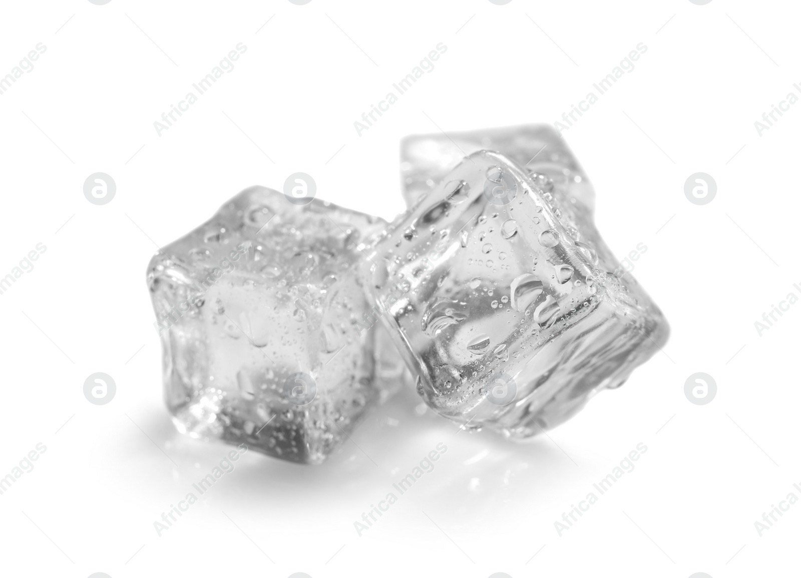 Photo of Crystal clear ice cubes on white background