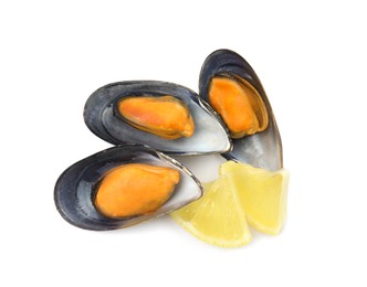 Delicious cooked mussels with lemon on white background, top view