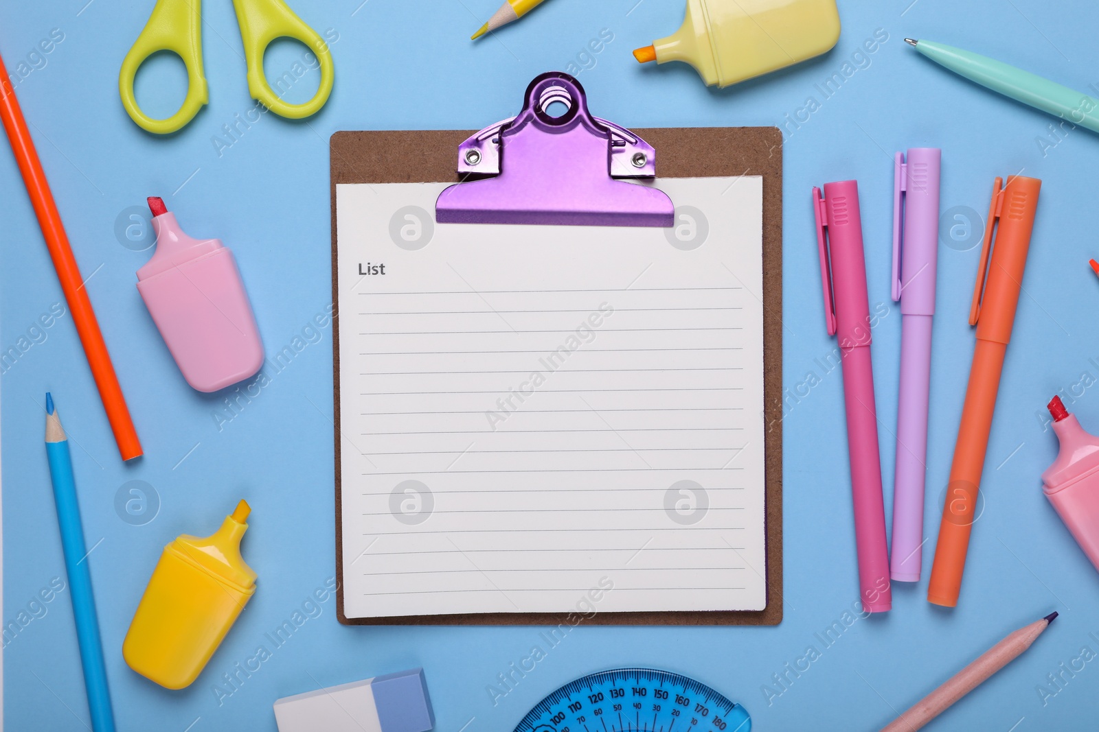 Photo of Flat lay composition of clipboard with notes and other school stationery on light blue background, space for text. Back to school