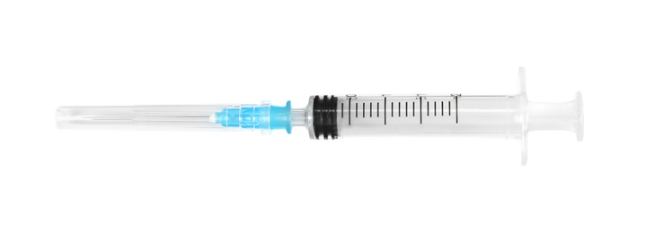 Photo of Plastic syringe on white background. Medical instrument
