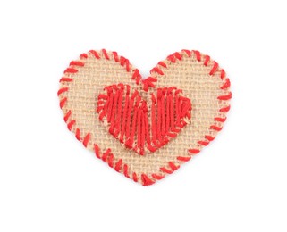 Heart of burlap fabric with red stitches isolated on white, top view