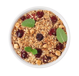 Tasty baked oatmeal with berries and nuts in bowl isolated on white, top view