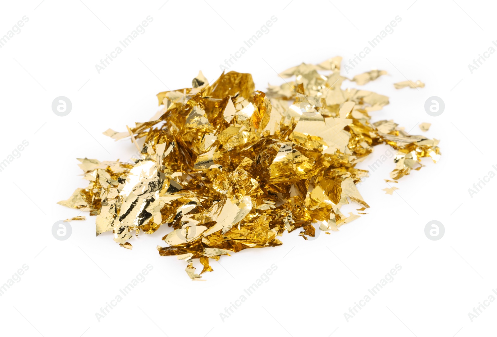 Photo of Pile of edible gold leaf on white background