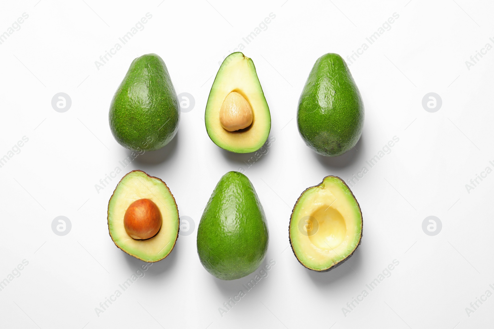 Photo of Composition with ripe fresh avocados on white background