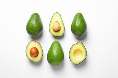 Photo of Composition with ripe fresh avocados on white background