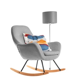 Rocking armchair with pillow on white background