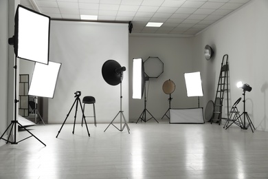 Interior of modern photo studio with professional equipment