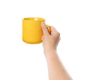 Photo of Woman holding yellow cup on white background, closeup