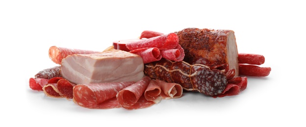 Different tasty meat delicacies on white background