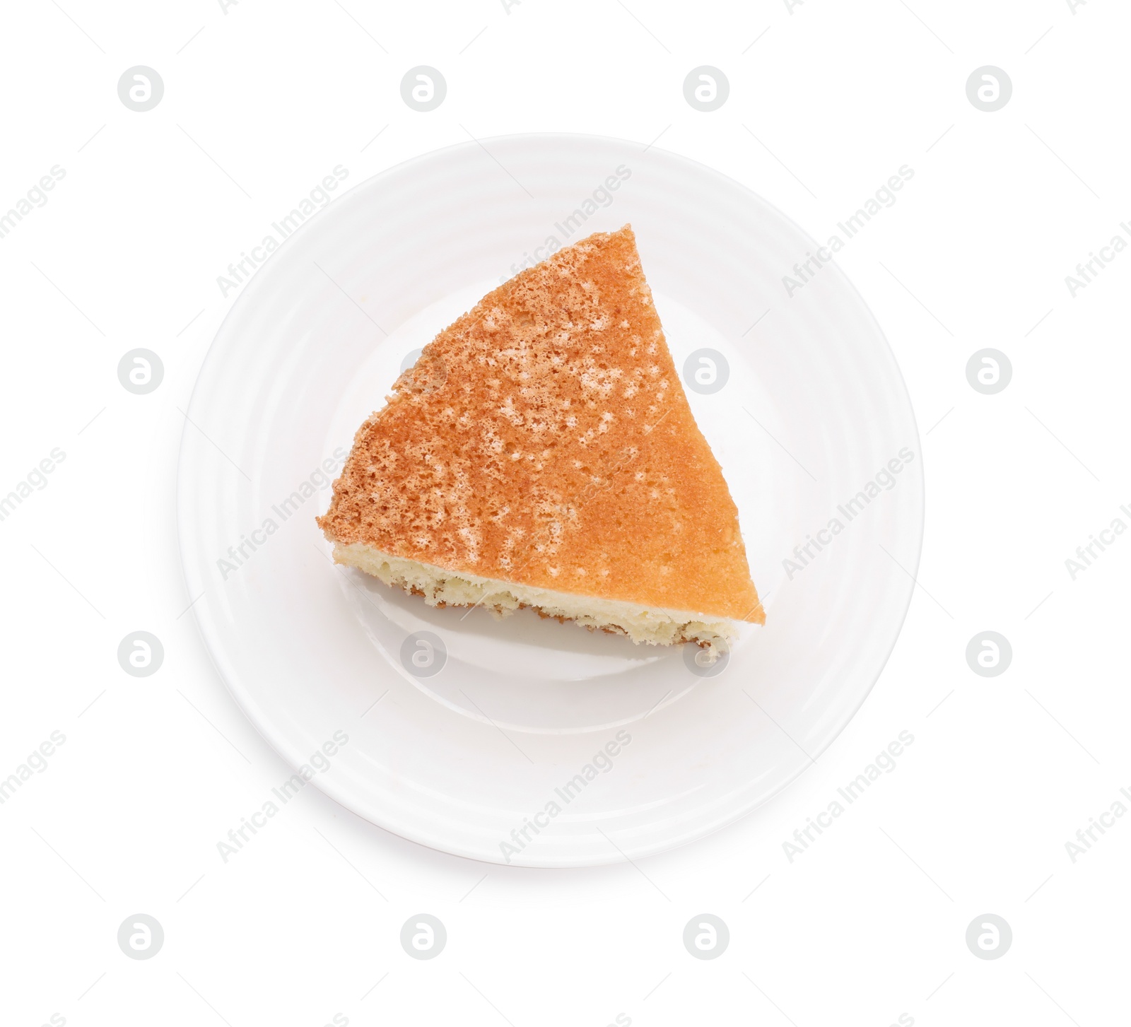 Photo of Plate with piece of tasty sponge cake isolated on white, top view