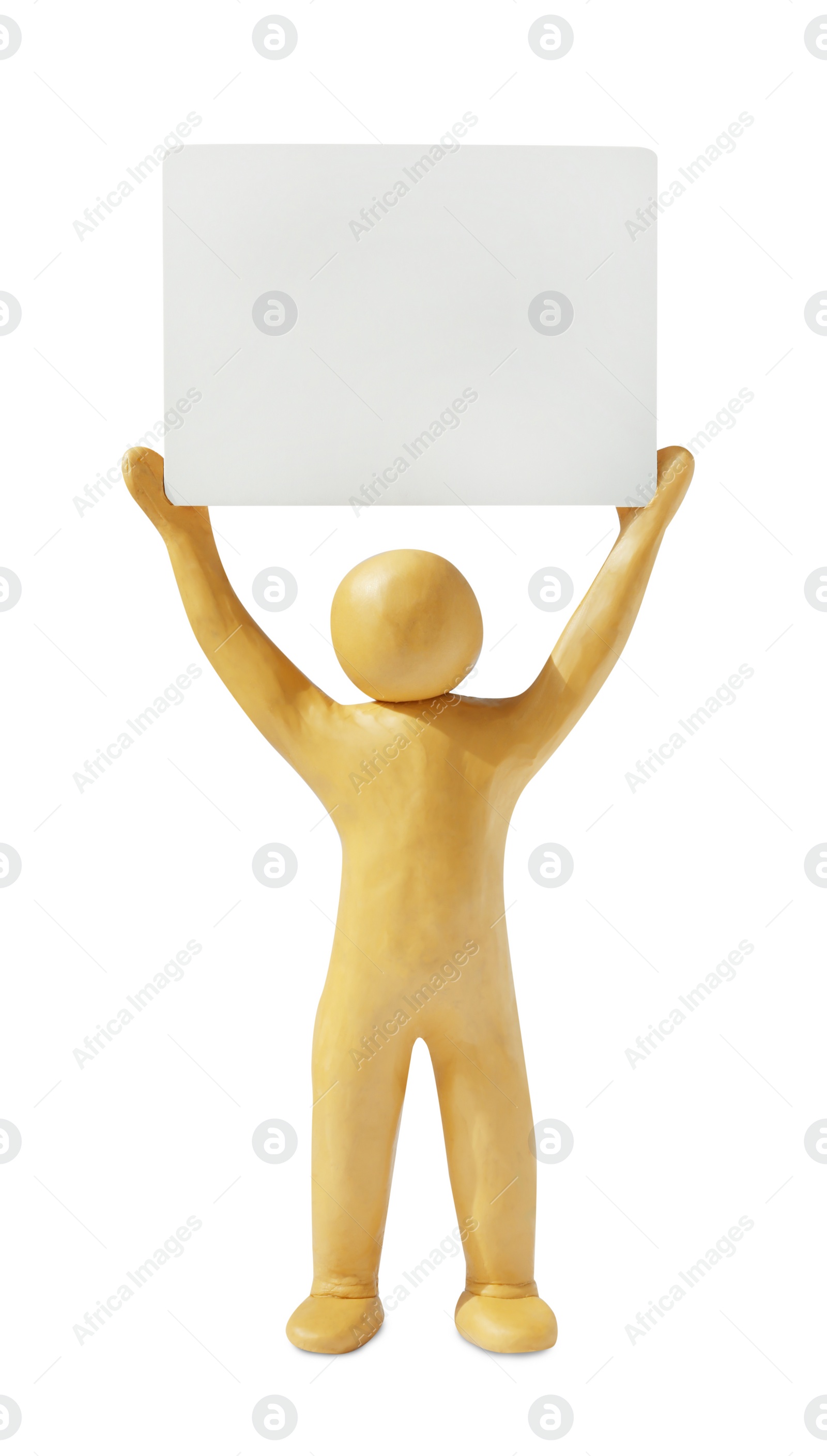 Photo of Human figure made of yellow plasticine holding blank paper sheet isolated on white