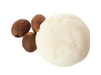 Photo of Fresh shea butter and nuts isolated on white, top view