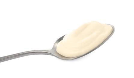 Spoon with tasty mayonnaise isolated on white