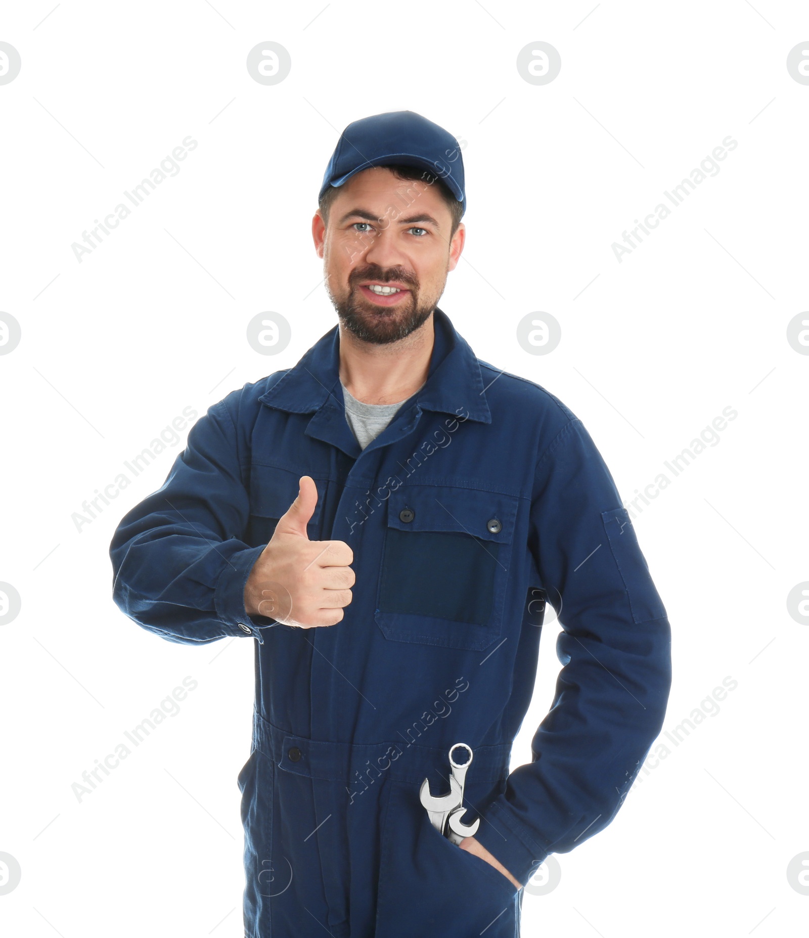Photo of Portrait of professional auto mechanic with wrenches on white background