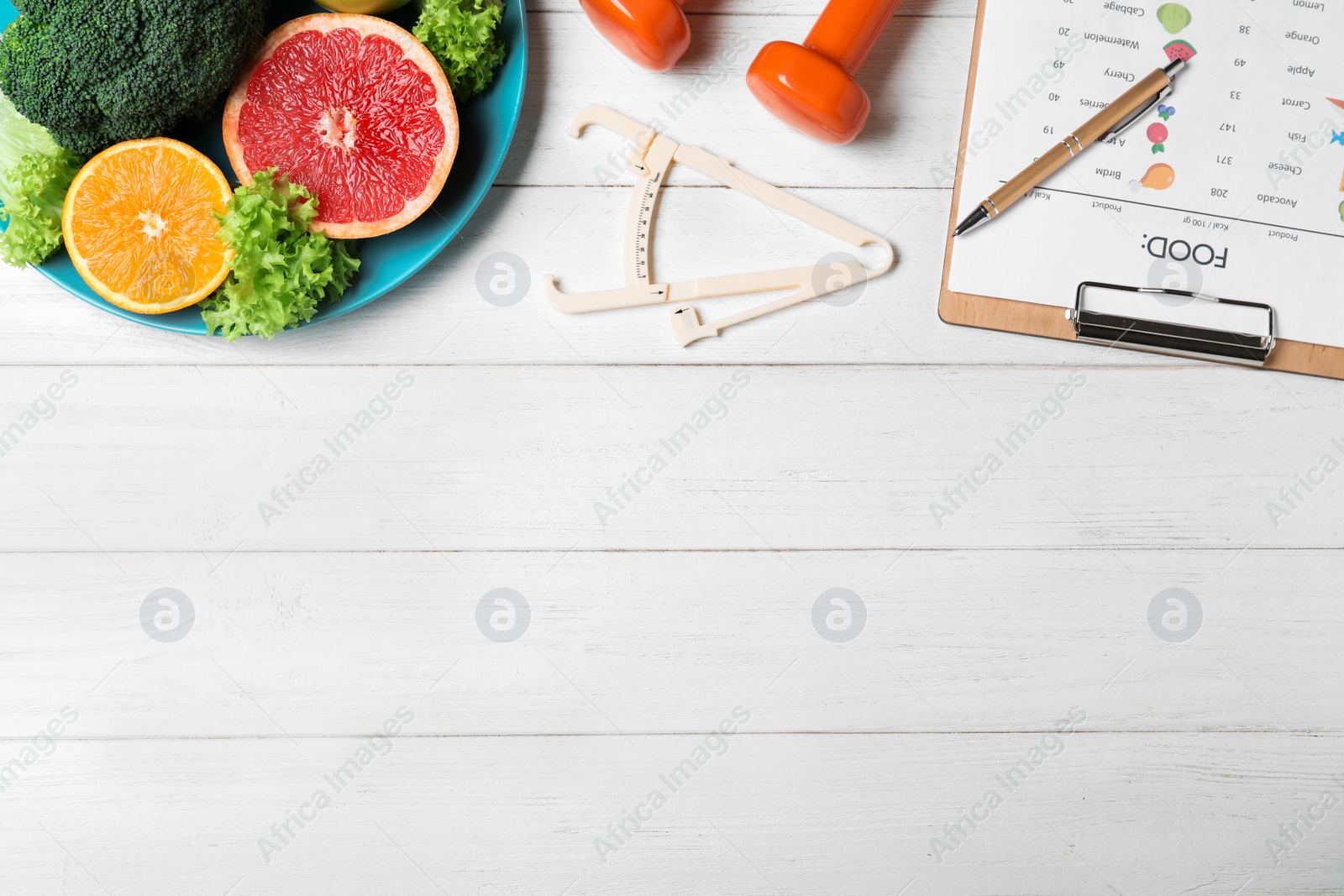 Photo of Fruits, vegetables, dumbbells, caliper and list of products on white wooden background, flat lay with space for text. Visiting nutritionist