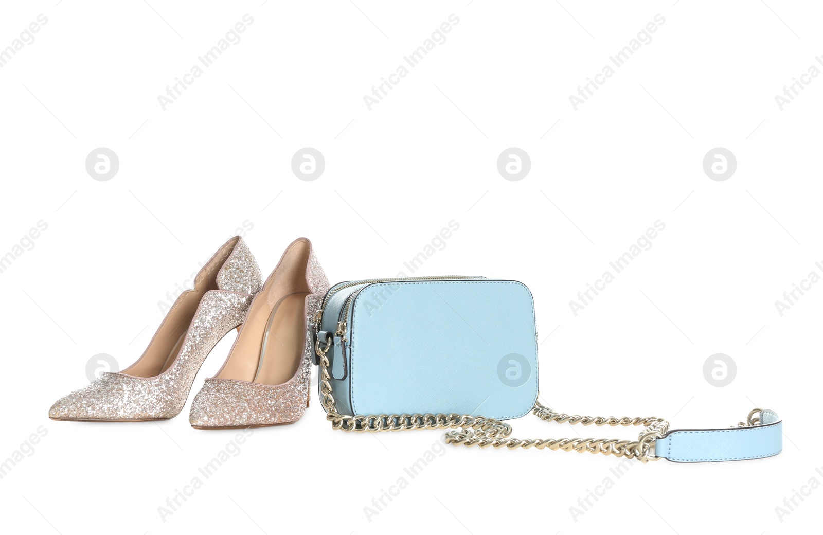 Photo of Stylish blue woman's bag and shoes isolated on white