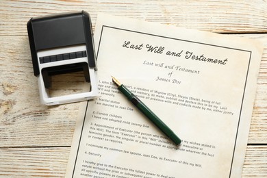 Photo of Last Will and Testament with stamp and pen on white wooden table, top view