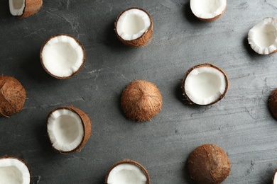 Photo of Coconut pattern on grey table, flat lay