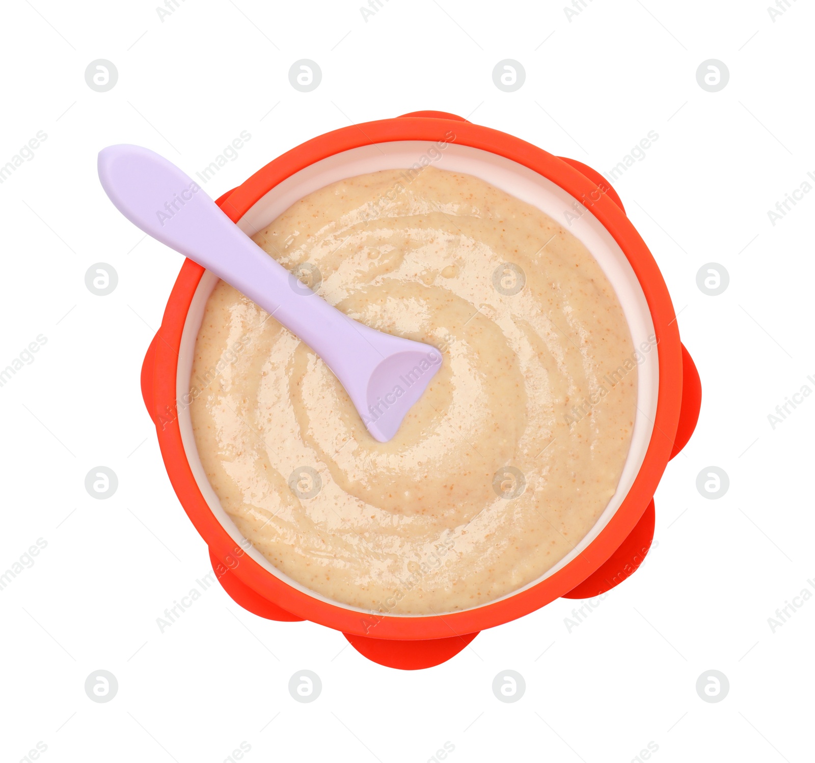 Photo of Tasty baby food and spoon in bowl isolated on white, top view