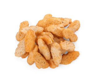 Photo of Pile of delicious crispy rusks on white background, top view