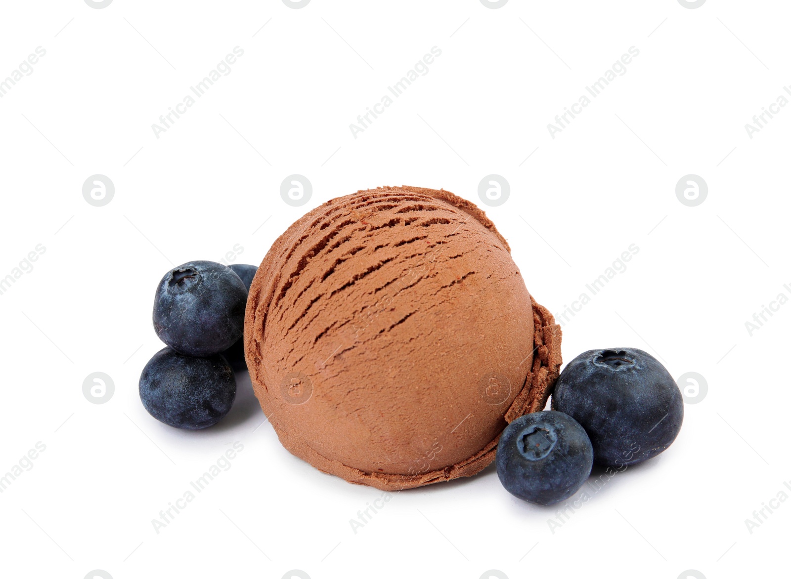 Photo of Scoop of chocolate ice cream and blueberries isolated on white