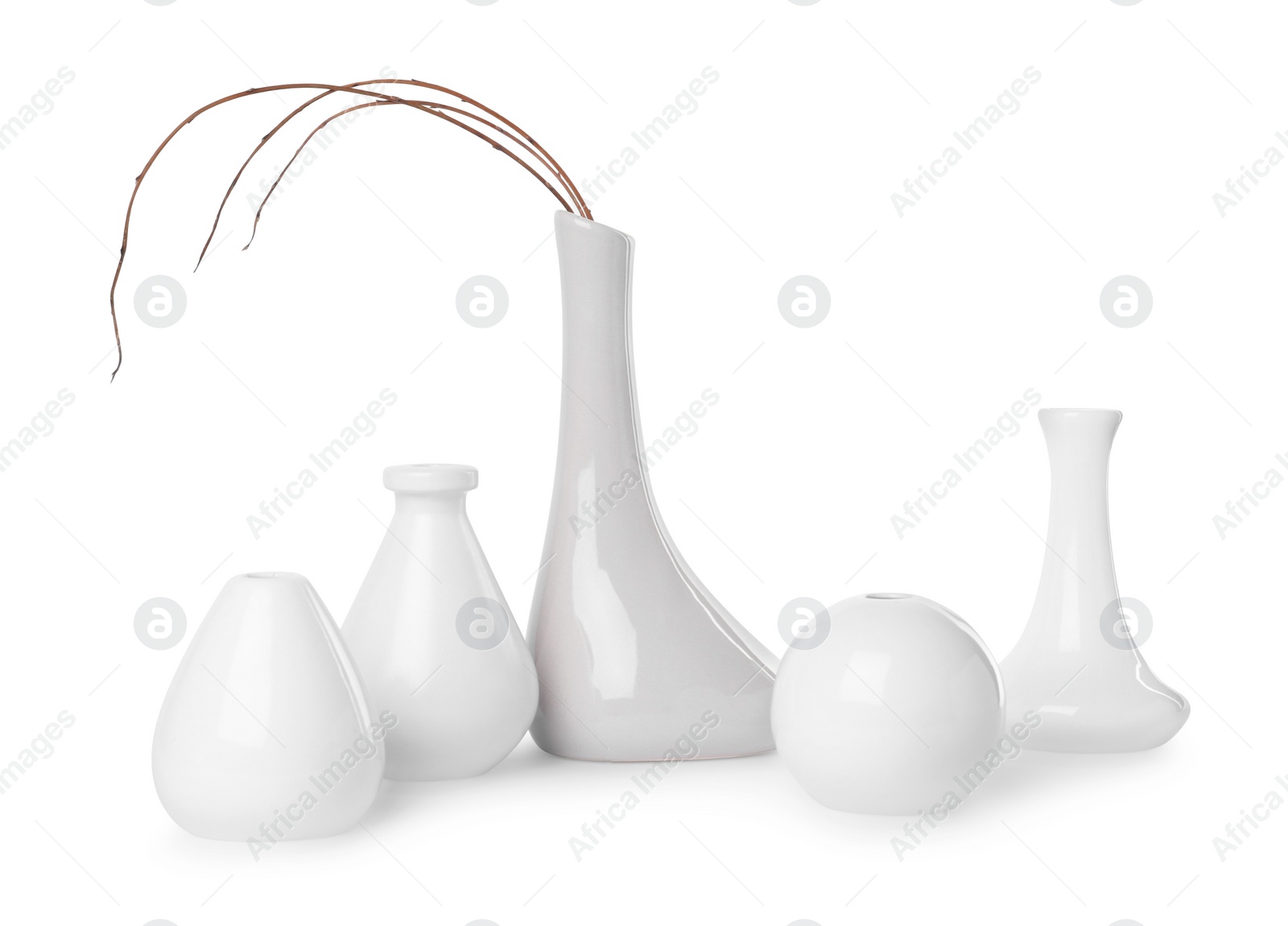 Photo of Many different stylish vases on white background