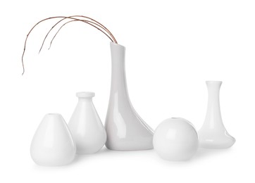 Photo of Many different stylish vases on white background