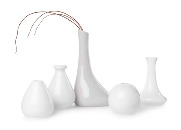 Many different stylish vases on white background