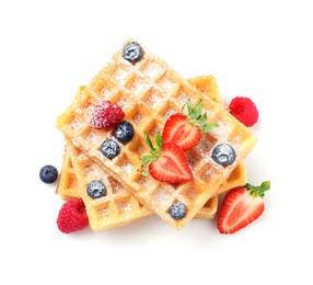 Photo of Delicious waffles with berries on white background, top view