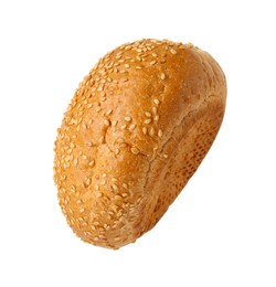 Photo of One fresh burger bun with sesame seeds isolated on white