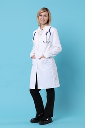 Smiling doctor in uniform on light blue background