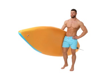 Handsome man with orange SUP board on white background